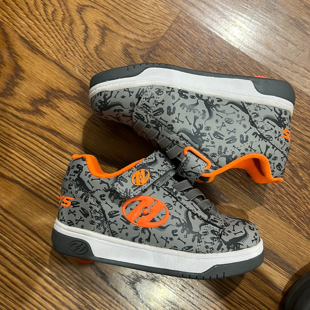 HEELYS brand roller skate shoes.
